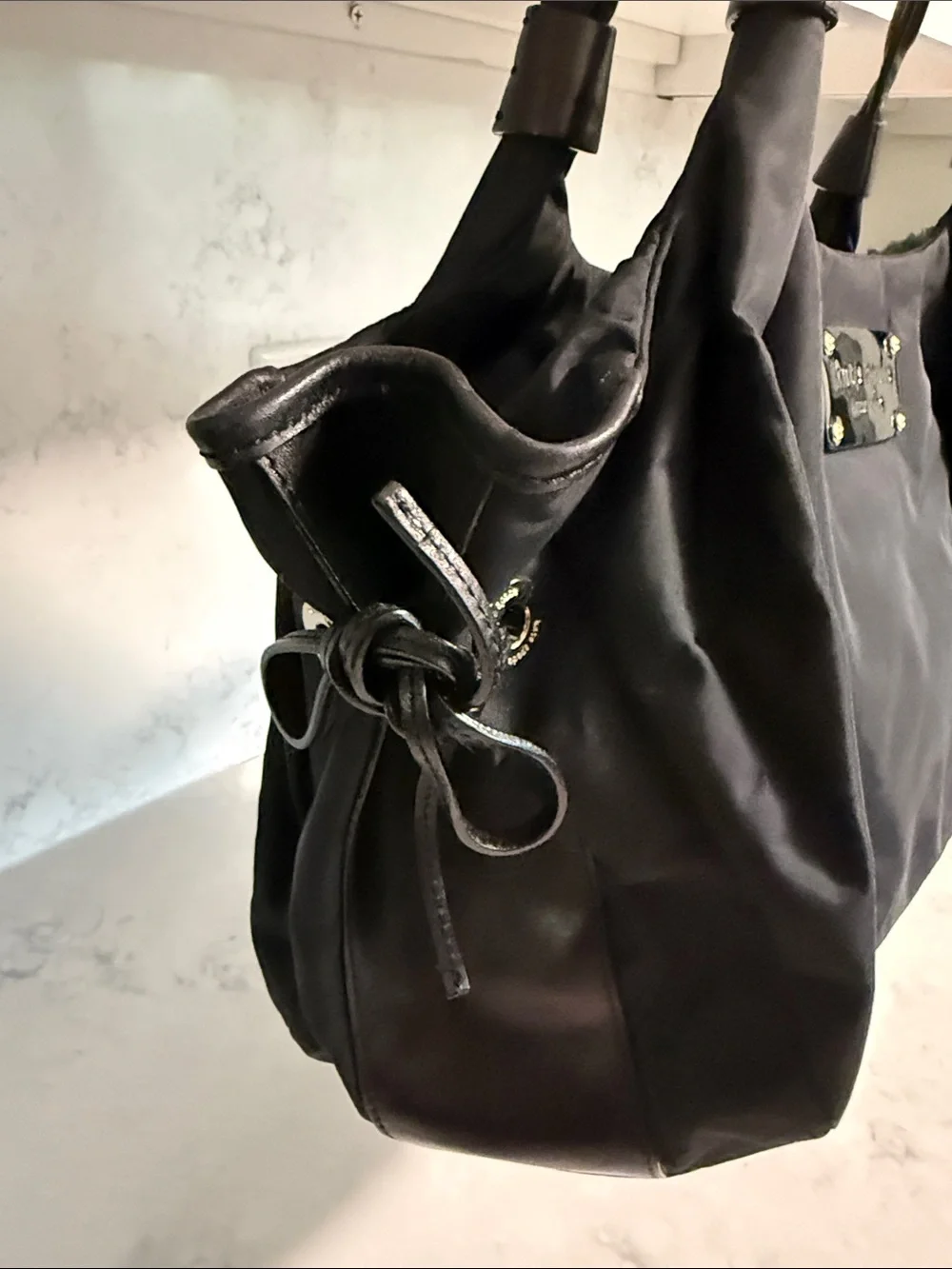 kate spade Black Nylon Shoulder Bag with Gold-Tone Plaque & Polka Dot Lining